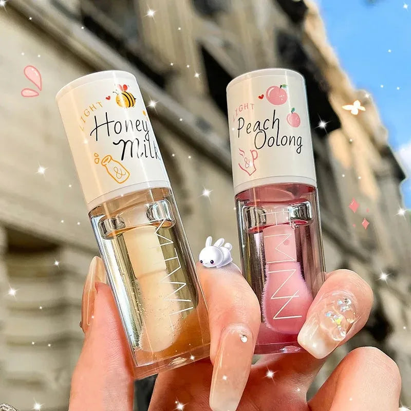 White Peach And Honey Lip Oil Soothes Dry Moisturizes And Does Not Fade Lovely Big Brush Head Lip Gloss